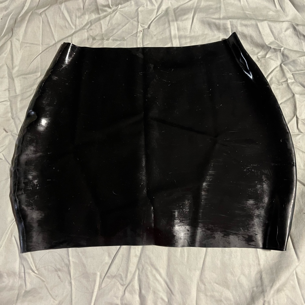 Black latex skirt, bow detail on back